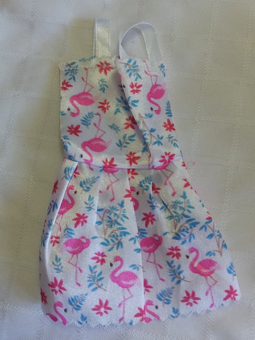 E - 5 mini Barbie dresses in various colors